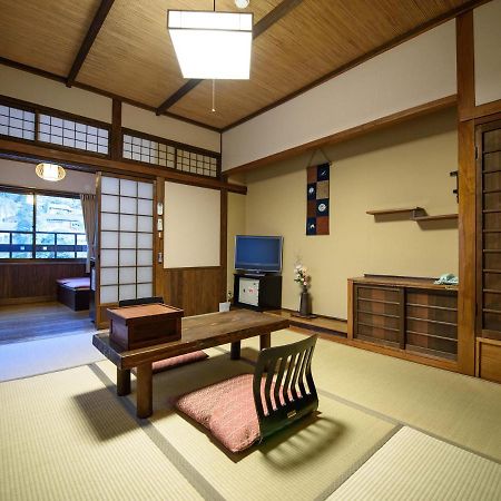 Yunohira Kamiyanagiya Hotel Yufu Bagian luar foto