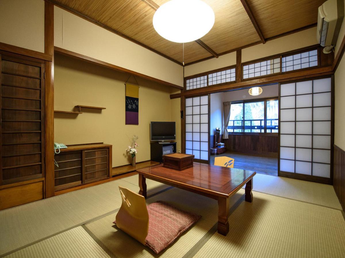 Yunohira Kamiyanagiya Hotel Yufu Bagian luar foto