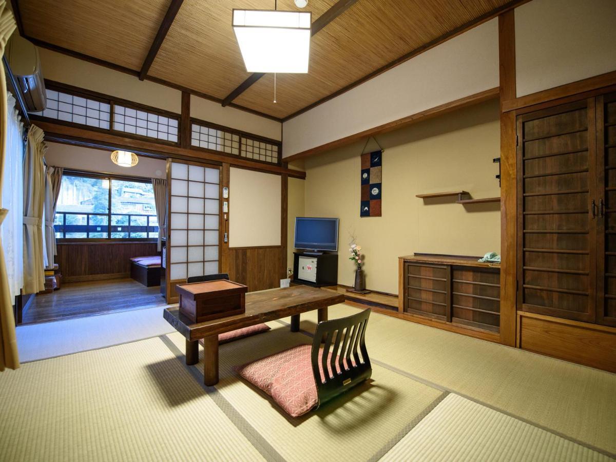 Yunohira Kamiyanagiya Hotel Yufu Bagian luar foto