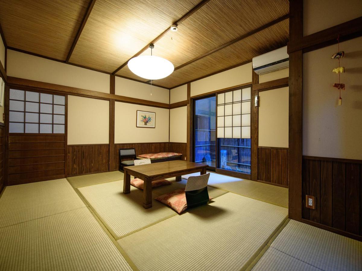 Yunohira Kamiyanagiya Hotel Yufu Bagian luar foto