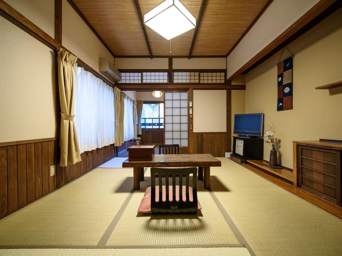 Yunohira Kamiyanagiya Hotel Yufu Bagian luar foto